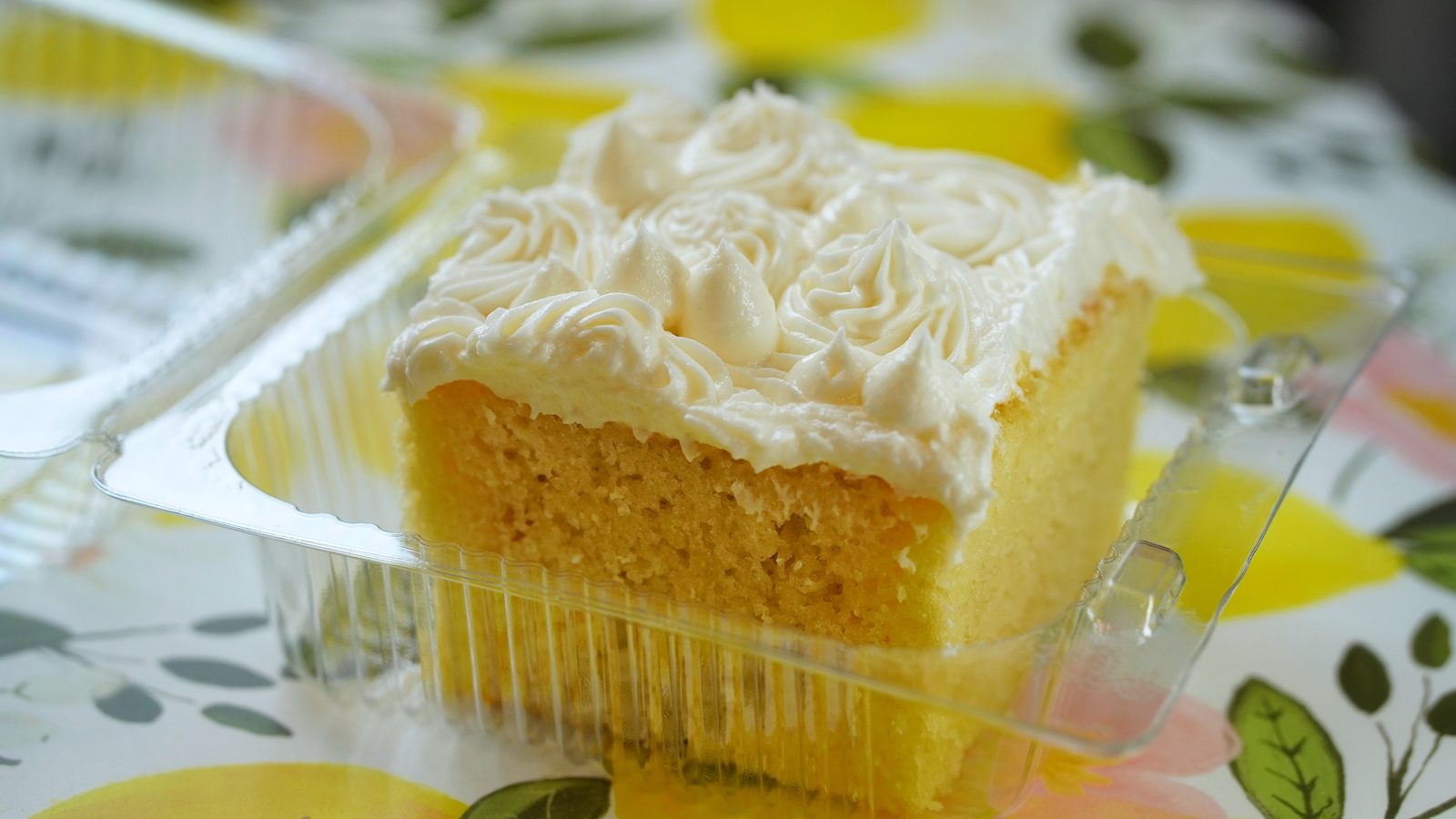 Slice of frosted cake with buttercream